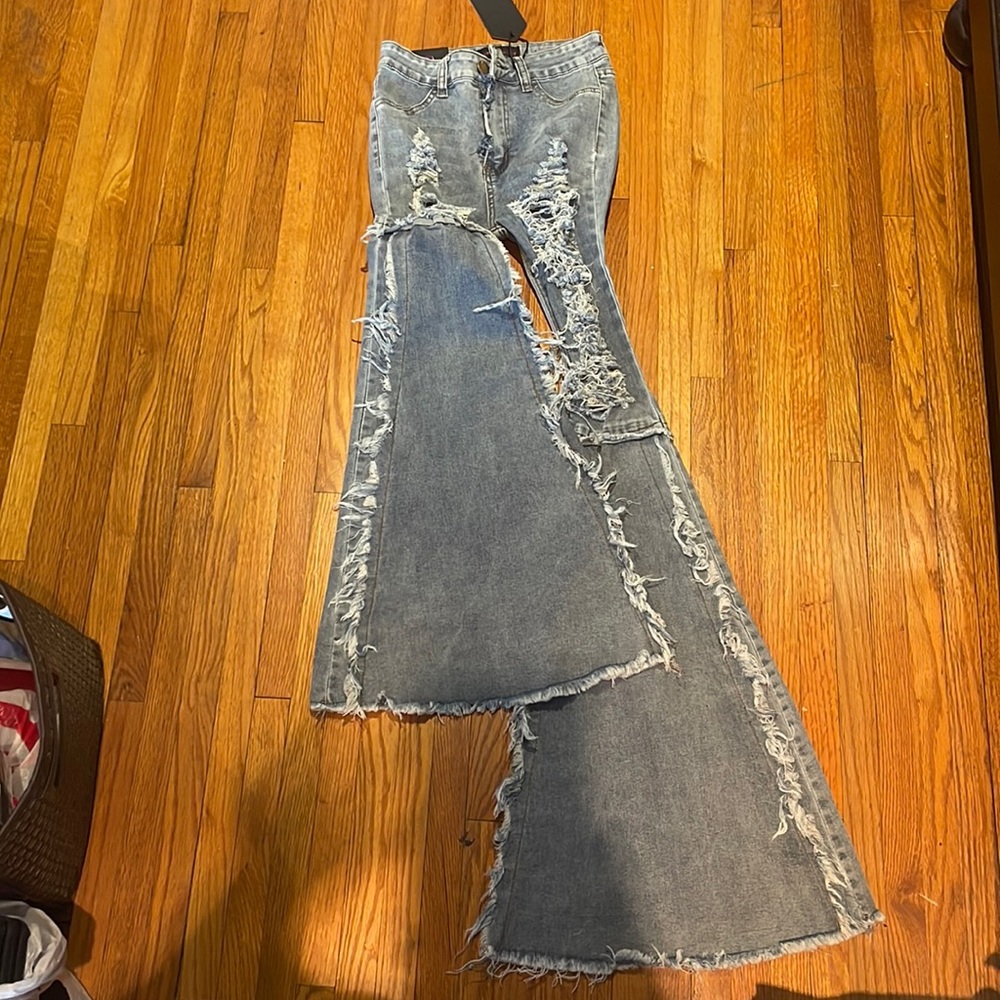 Flared Bottomed Ripped Jeans